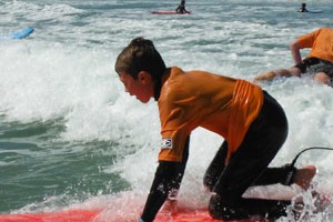 kids surfing lessons in Moana